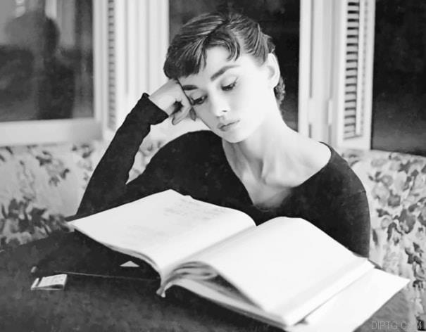 Audrey Hepburn Reading.jpg
